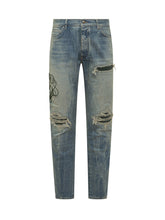 AMIRI - Jeans Slim Con Strappi E Ricami - Blu - LIDIASHOPPING® - Official Website