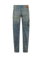 AMIRI - Jeans Slim Con Strappi E Ricami - Blu - LIDIASHOPPING® - Official Website