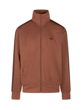 ADIDAS ORIGINALS - Jacket featuring a high collar, front zip fastening and long sleeves with side stripes. Detailed with a small chest logo, zipped front pockets and ribbed trims. - Brown - LIDIASHOPPING® - Official Website