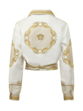 VERSACE - Shirt featuring a classic collar, long sleeves and a wrap front neckline. Detailed with an ornamental baroque print, a tie waist and defined cuffs. - White - LIDIASHOPPING® - Official Website