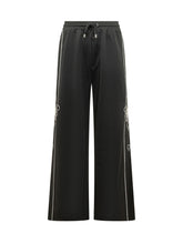 AMIRI - Pantaloni Lasso con Profili a Contrasto - Nero - LIDIASHOPPING® - Official Website