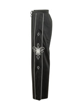 AMIRI - Pantaloni Lasso con Profili a Contrasto - Nero - LIDIASHOPPING® - Official Website