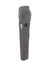 KIDSUPER - Wide leg sweatpants featuring a straight silhouette and an elasticated waistband with adjustable drawstring. Detailed with a stylized eye applique on the upper leg and straight hems. - Grey - LIDIASHOPPING® - Official Website