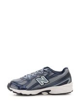 NEW BALANCE - Low top sneakers featuring mesh inserts and geometric side overlays. Designed with front lace fastening, an applied side logo, padded collar and a chunky sculpted sole with textured tread. - Blue - LIDIASHOPPING® - Official Website
